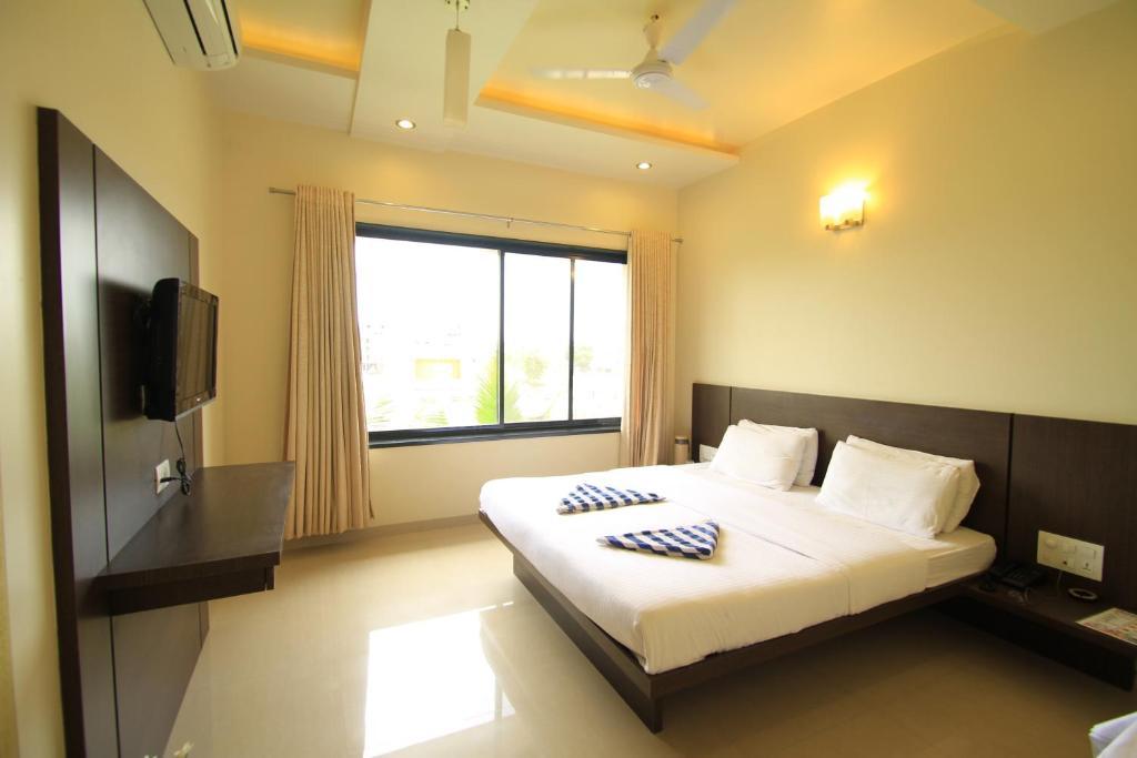 Hotel Sai Smaran Shirdi Quarto foto