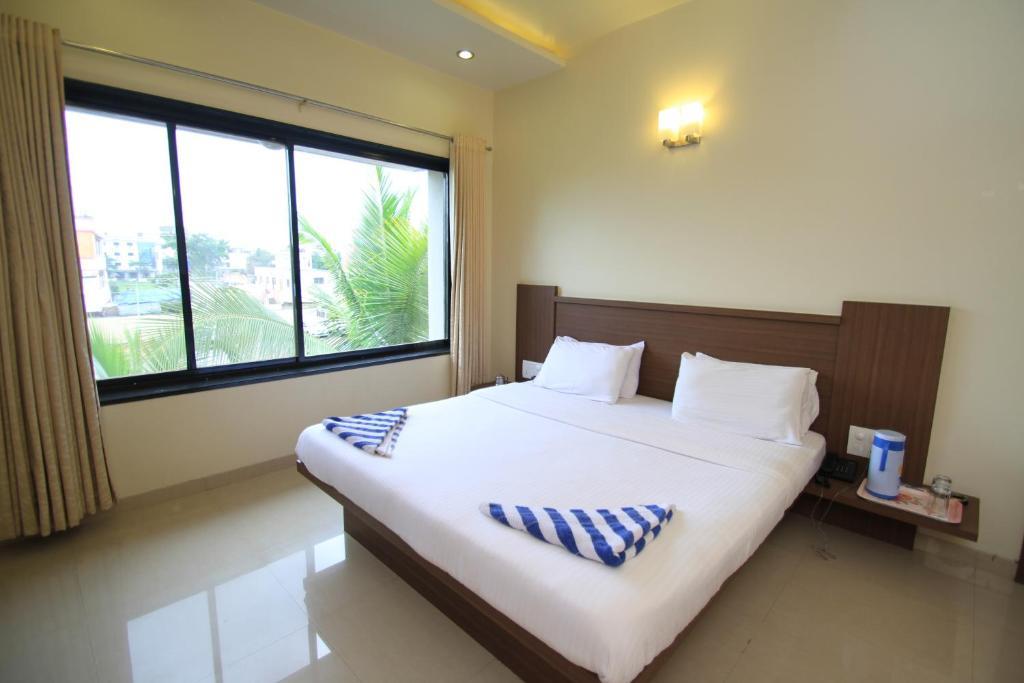 Hotel Sai Smaran Shirdi Quarto foto