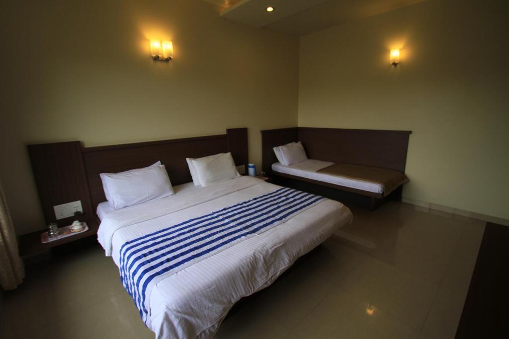 Hotel Sai Smaran Shirdi Quarto foto