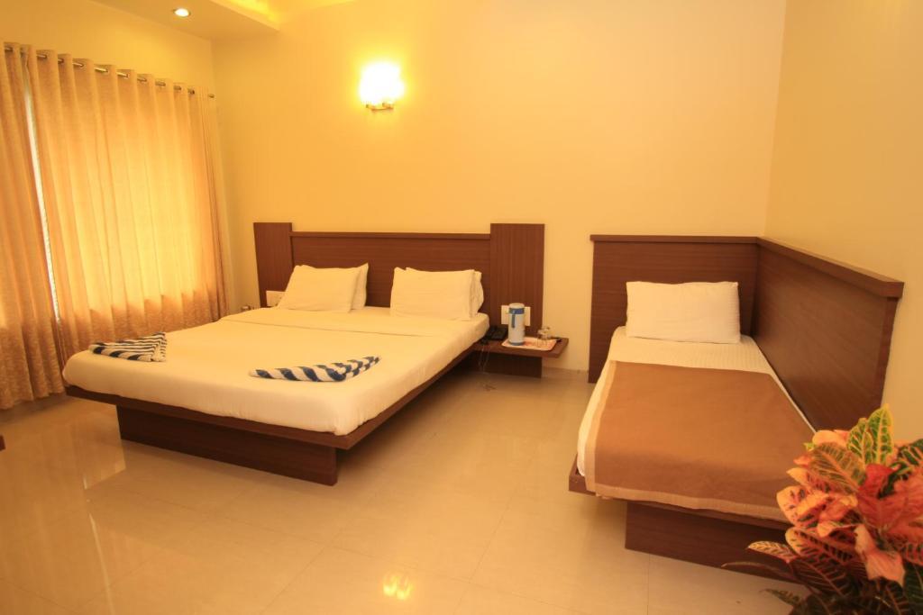 Hotel Sai Smaran Shirdi Quarto foto